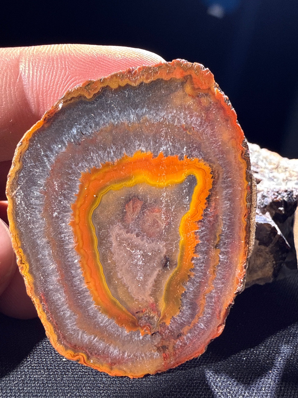 Zhanguo Agate specimen from Xuanhua, Zhangjiakou — deep orange, yellow, and gray banded zhanguo agate, vitreous luster, translucent (5.5×4.1×1.8 cm), additional angle view — ZHA-0033