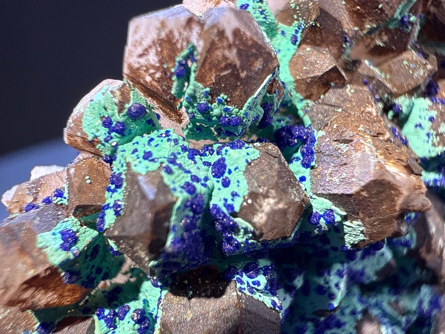 Olivenite with azurite and Quartz specimen from Dongchuan, Yunnan — olive-green olivenite with deep blue azurite on colorless quartz, vitreous to subadamantine (olivenite), vitreous (quartz), earthy (azurite) luster, olivenite: translucent; azurite: opaque to translucent microcrystalline; quartz: transparent (5.1×4.5×6.5 cm), additional angle view — OLI-0037