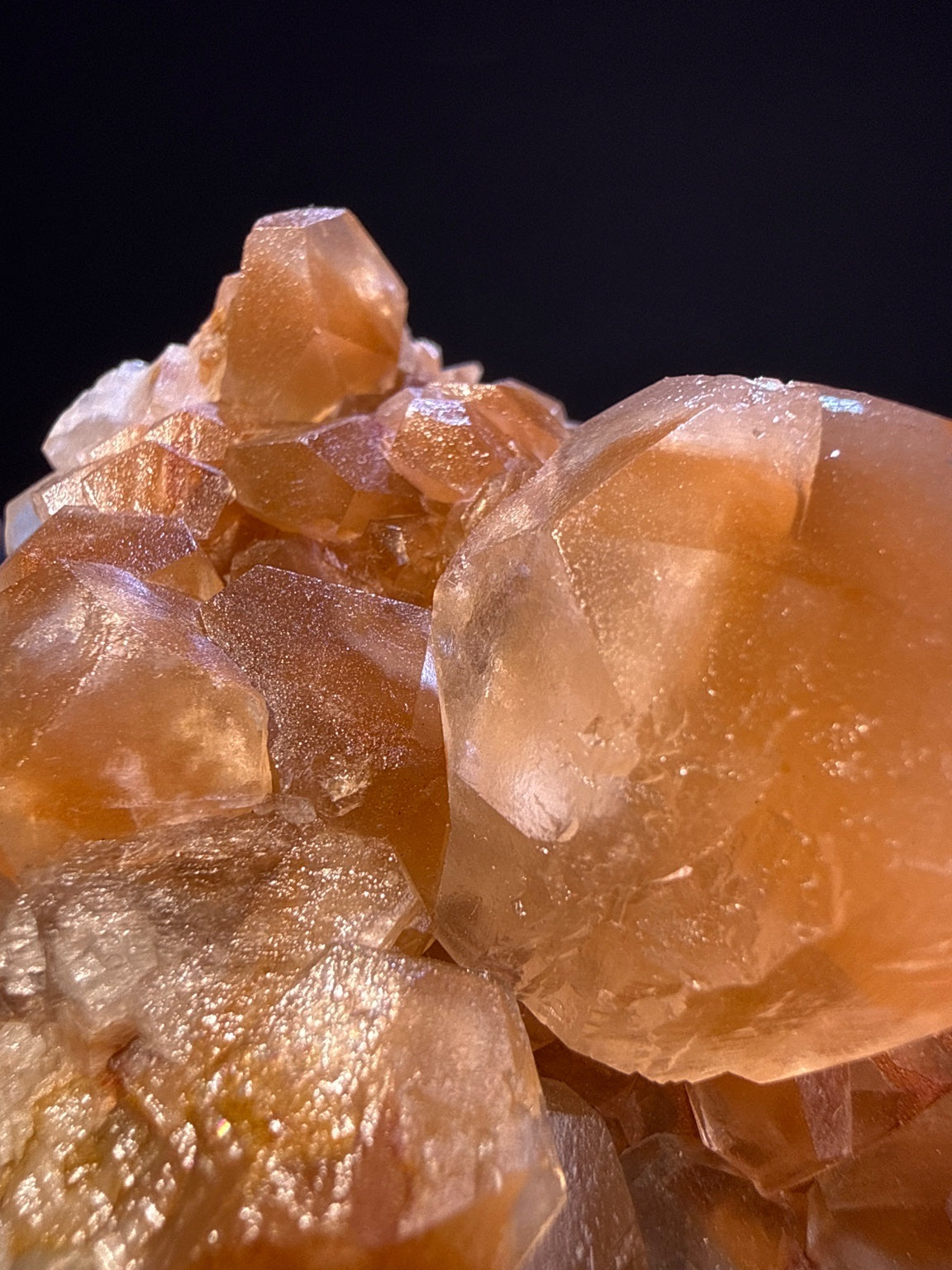 Calcite specimen from Daye, Hubei — orange, vitreous luster, translucent (5.2×6.8×4.1 cm), close-up detail of crystal structure — CAL-0039