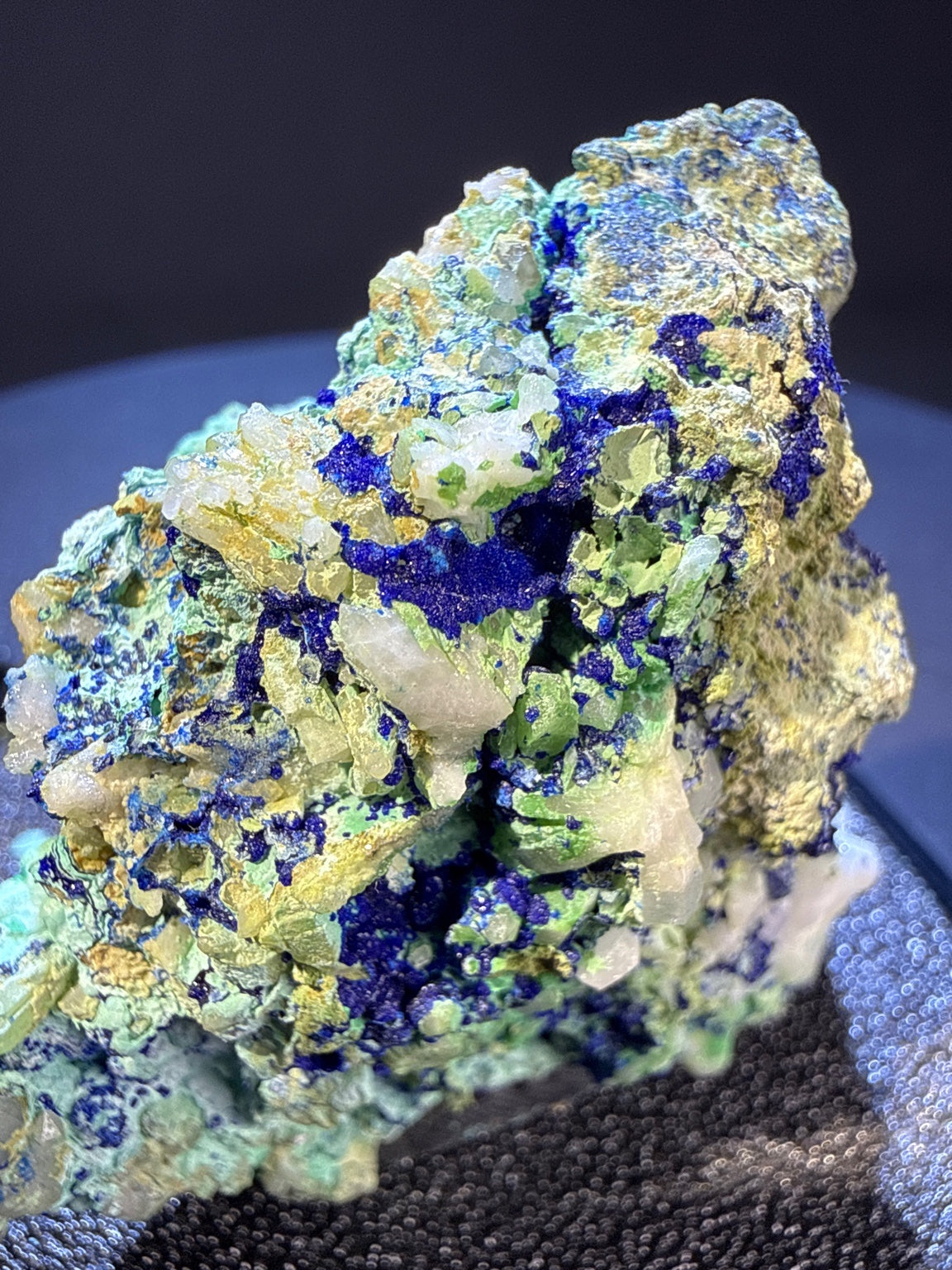 Olivenite with azurite and Quartz specimen from Dongchuan, Yunnan — olive-green olivenite with blue azurite and clear quartz, vitreous to subadamantine luster, translucent to opaque (5.5×3.5×5.0 cm), close-up detail of crystal structure — OLI-0038