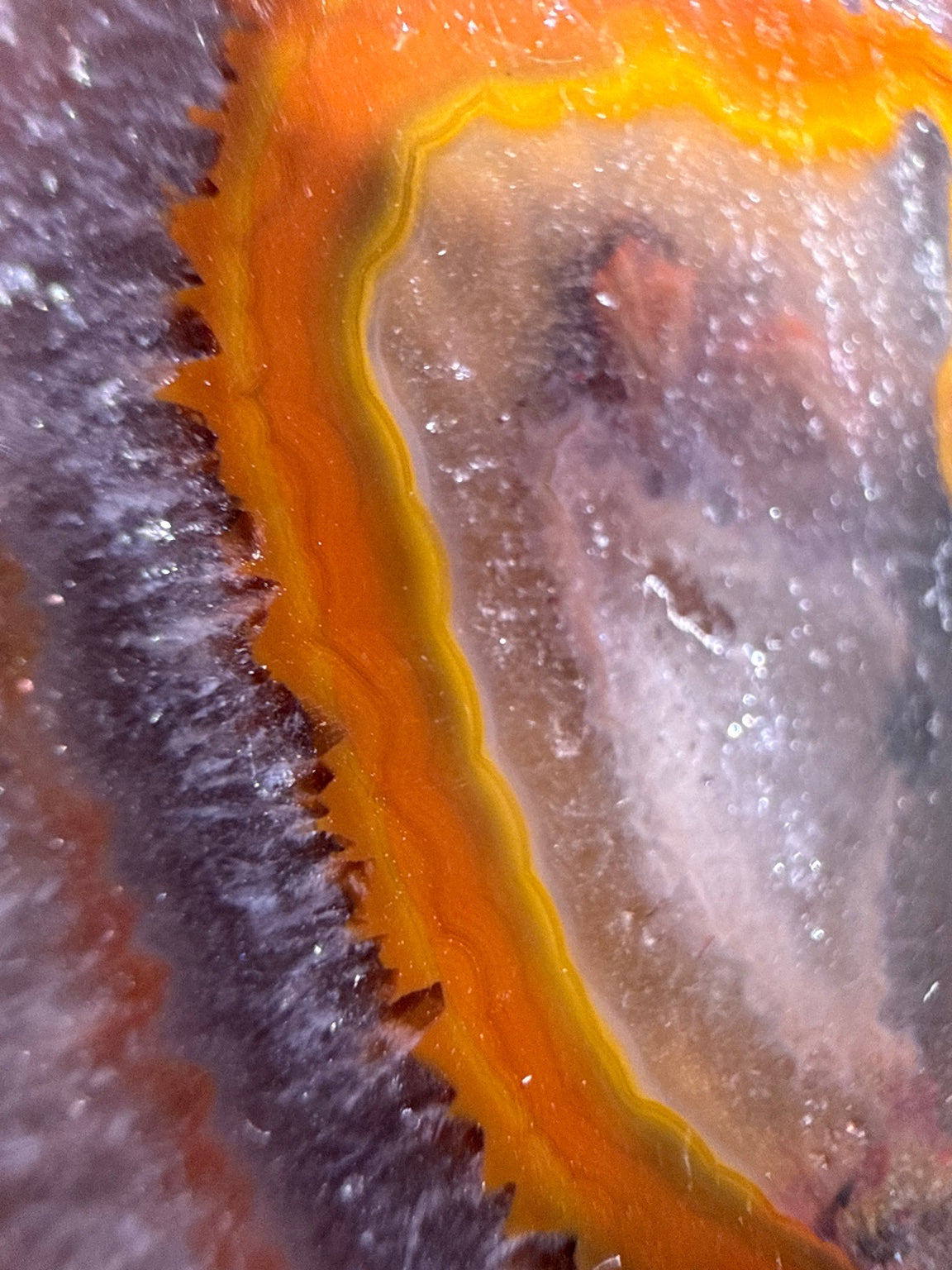 Zhanguo Agate specimen from Xuanhua, Zhangjiakou — deep orange, yellow, and gray banded zhanguo agate, vitreous luster, translucent (5.5×4.1×1.8 cm), close-up detail of crystal structure — ZHA-0033