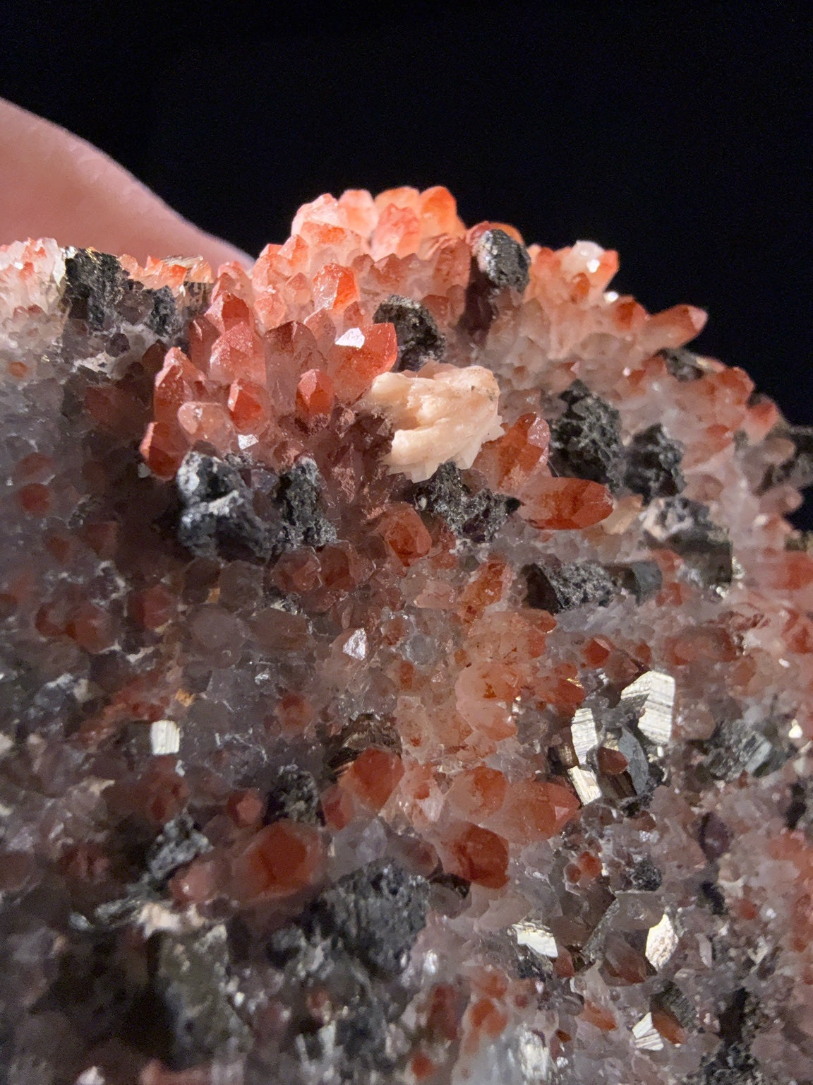 Hematite-included Quartz with Pyrite and Dolomite and Galena and Chalcopyrite specimen from huya, jiangxi — red with inclusions, vitreous luster, transparent to translucent (8.5×3.5×6.2 cm), close-up detail of crystal structure — HEM-0023