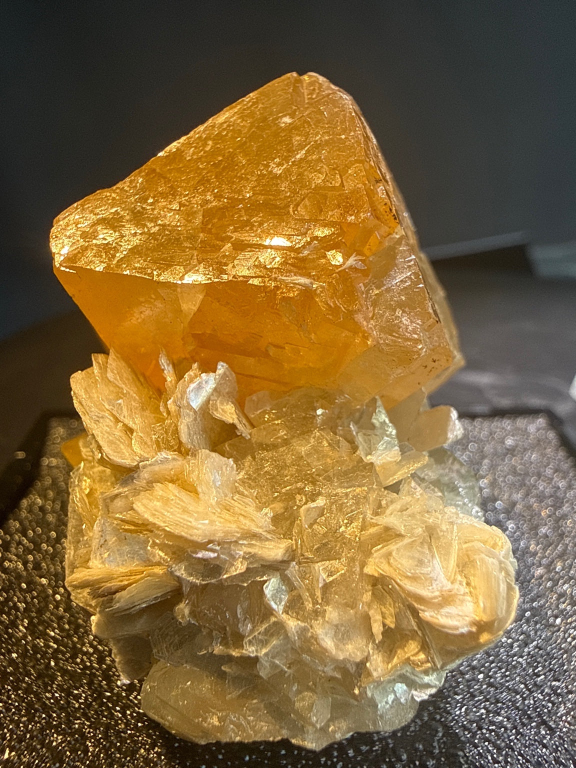 Scheelite with Muscovite specimen from Xuebaoding, Sichuan — fiery orange scheelite on silvery muscovite, vitreous to resinous (scheelite), pearly (muscovite) luster, translucent to transparent (scheelite), transparent on edges (muscovite) (4×4×5 cm), additional angle view — SCH-0042