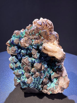 Olivenite with azurite and Quartz specimen from Dongchuan, Yunnan — olive-green olivenite with deep blue azurite on colorless quartz, vitreous to subadamantine (olivenite), vitreous (quartz), earthy (azurite) luster, olivenite: translucent; azurite: opaque to translucent microcrystalline; quartz: transparent (5.1×4.5×6.5 cm) — OLI-0037