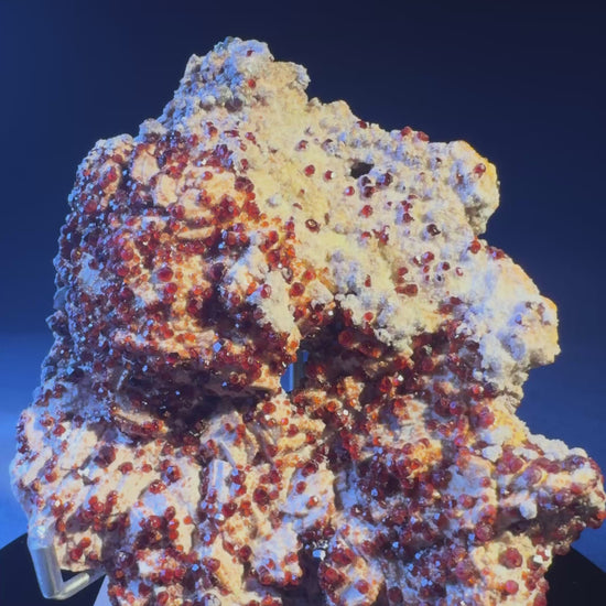 garnet specimen with sparkling reddish-orange crystals on matrix, Fujian, China.