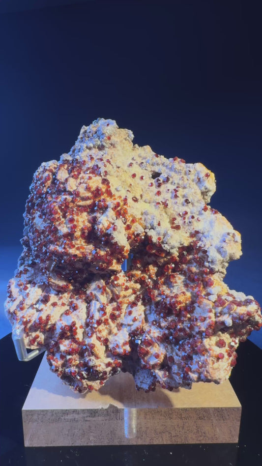 garnet specimen with sparkling reddish-orange crystals on matrix, Fujian, China.